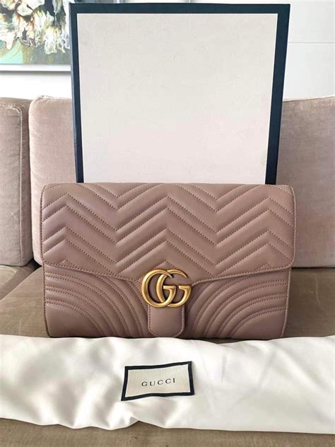 gucci guccissima clutch|gucci marmont clutch bag.